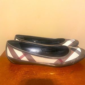 Burberry flats for sale at $141. In excellent condition.